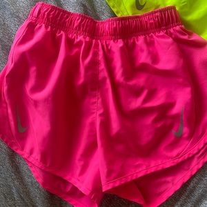 Nike running shorts/don’t fit me anymore/super cute/very bright colored